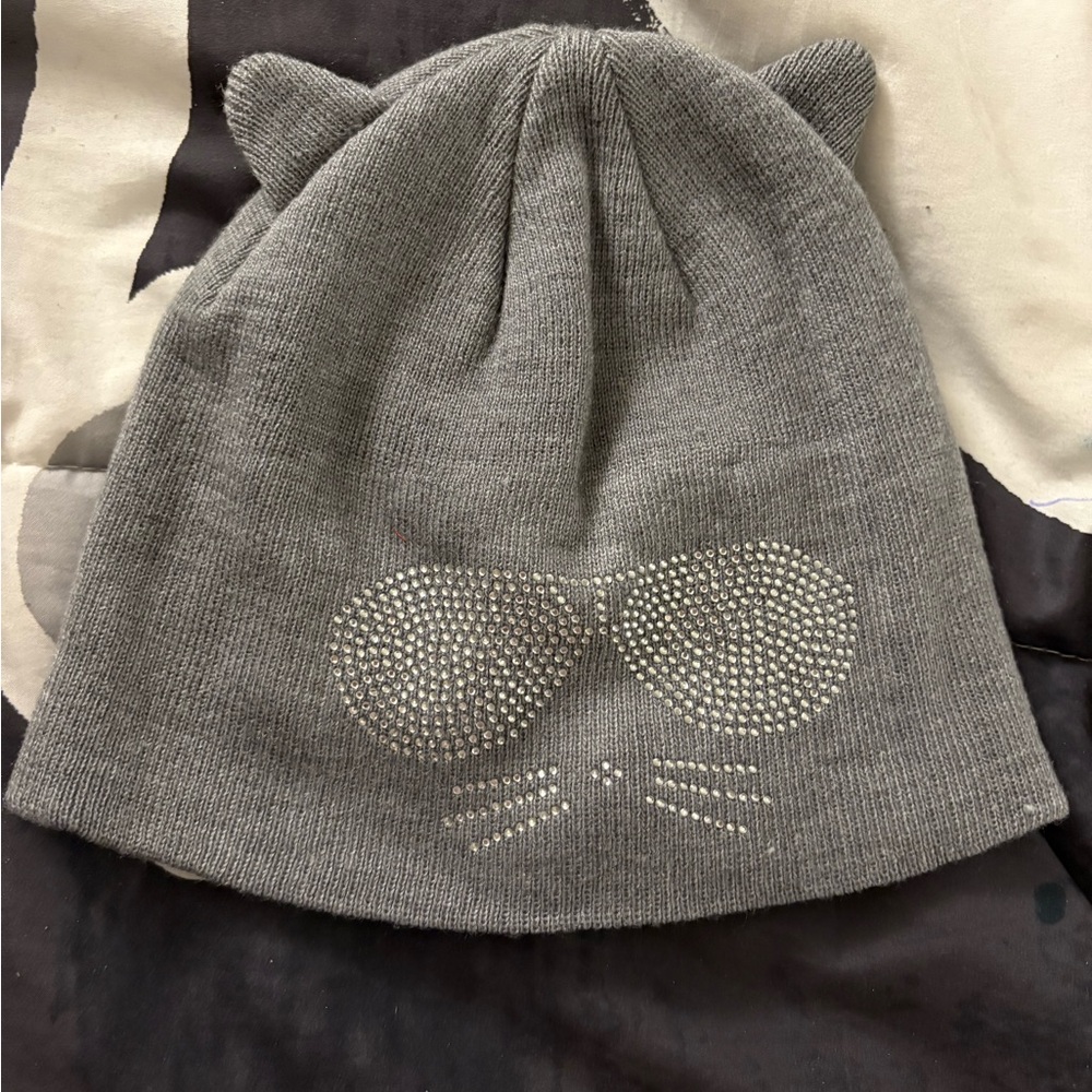 Karl Lagerfeld Gray Cat Ear Beanie with Rhinestone Design and ears.